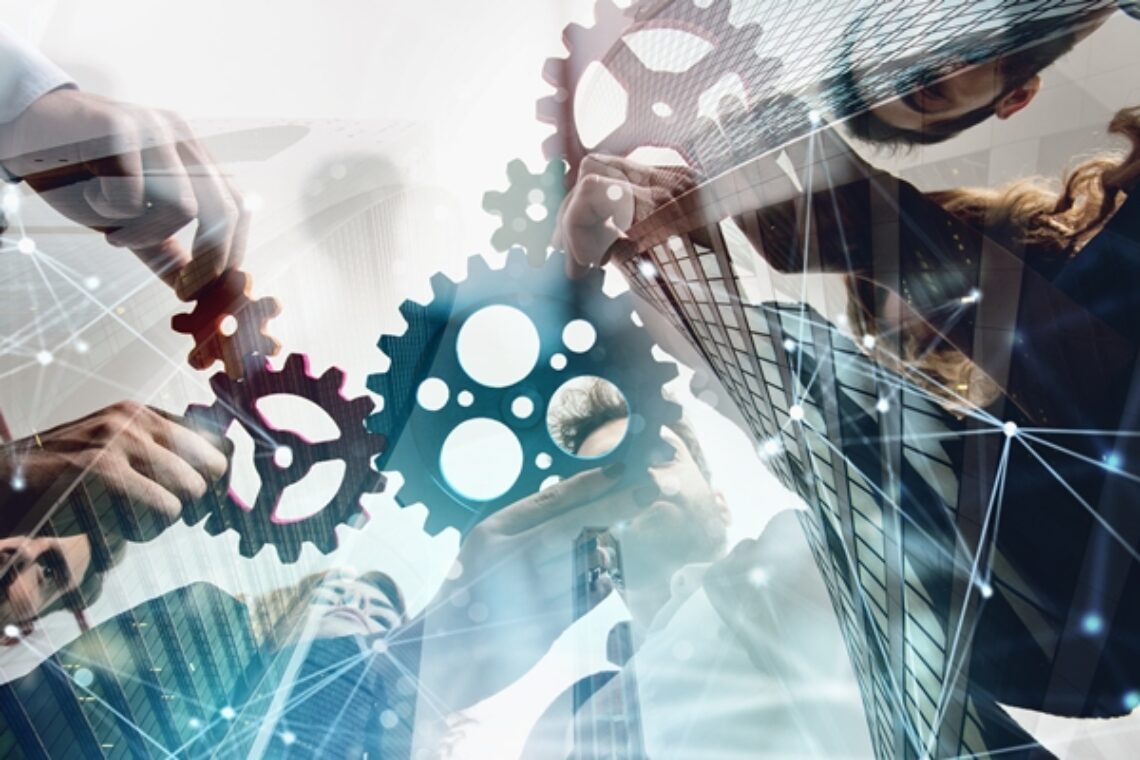 Business,Team,Connect,Pieces,Of,Gears.,Teamwork,,Partnership,And,Integration